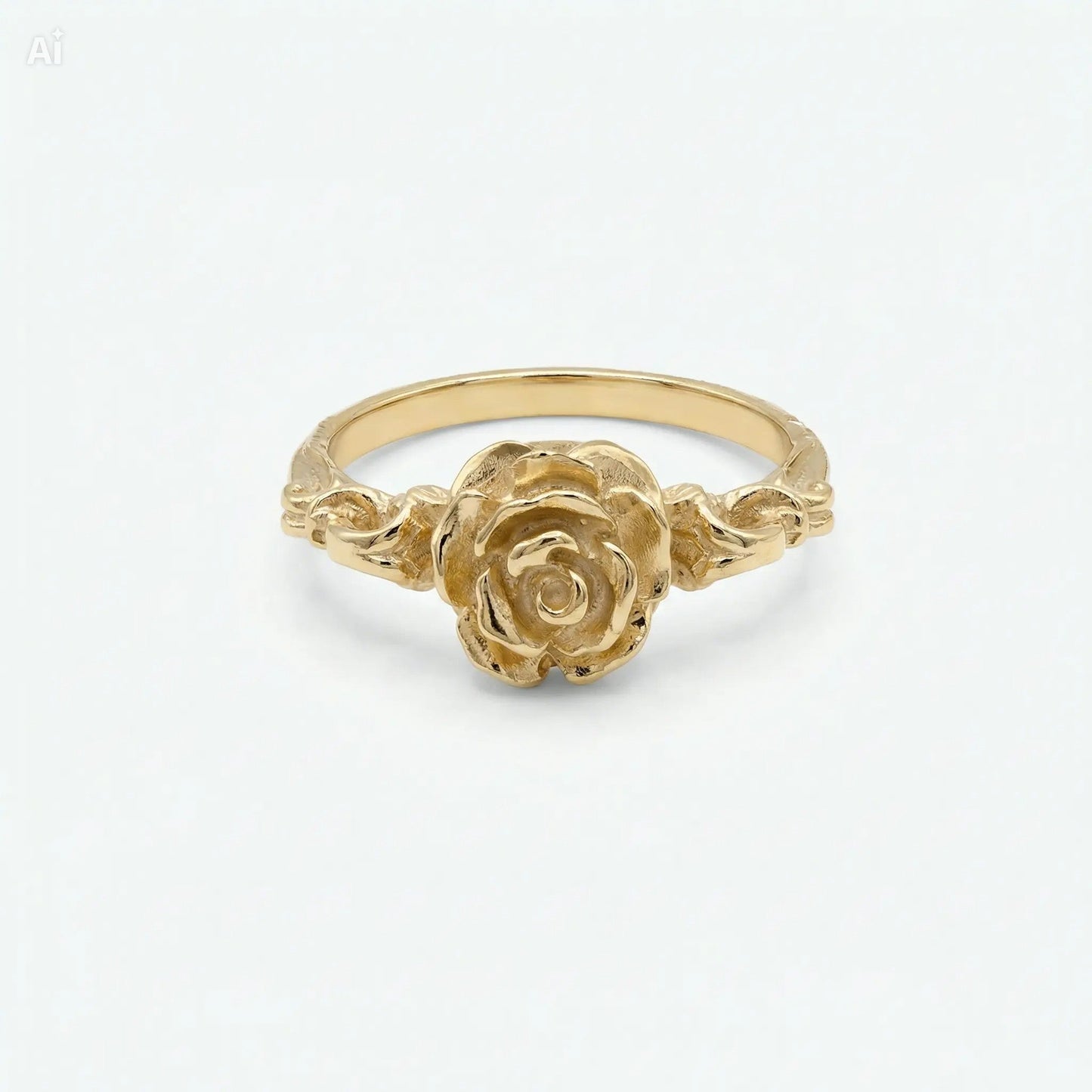 Vista frontale di un anello in bronzo dorato con rosa fiorita finemente incisa, gioiello floreale elegante con gambo decorato, ideale per fidanzamento o regalo