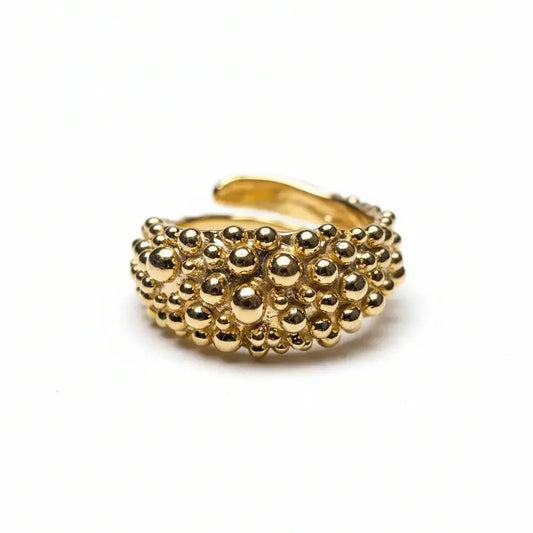 Anello a fascia regolabile in oro dal design organico con texture a microsfere in rilievo, Studio Gioielli E-co.